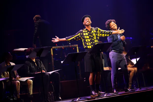 Terrance Johnson (left) sings the role of Tom Collins in "Rent in Concert." (Nick Piacente)