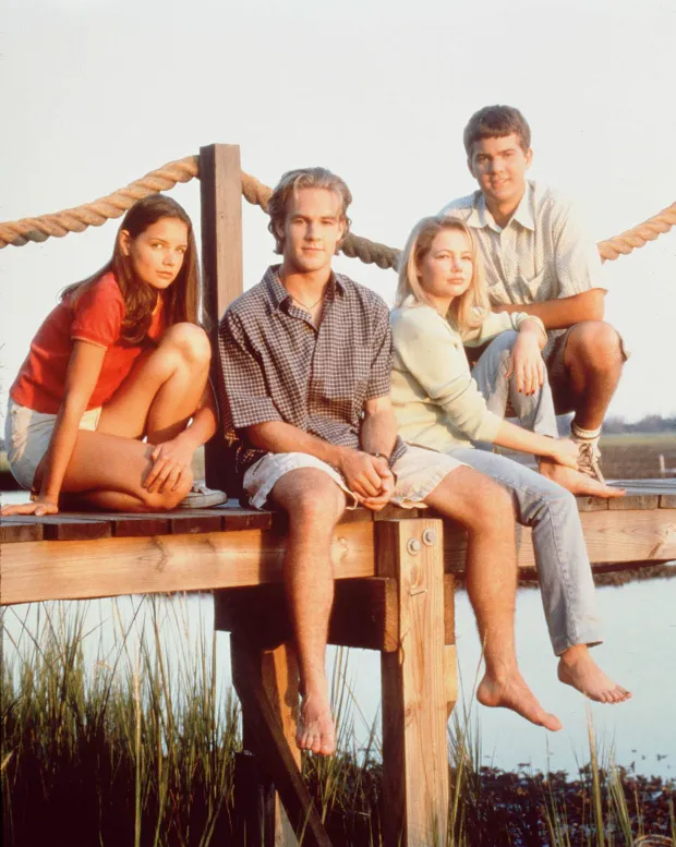 The cast of television's "Dawson's Creek" poses for a photo in 1997. From left to right are Katie Holmes, James Van Der Beek, Michelle Williams, and Joshua Jackson. (Photo by Warner Bros.)