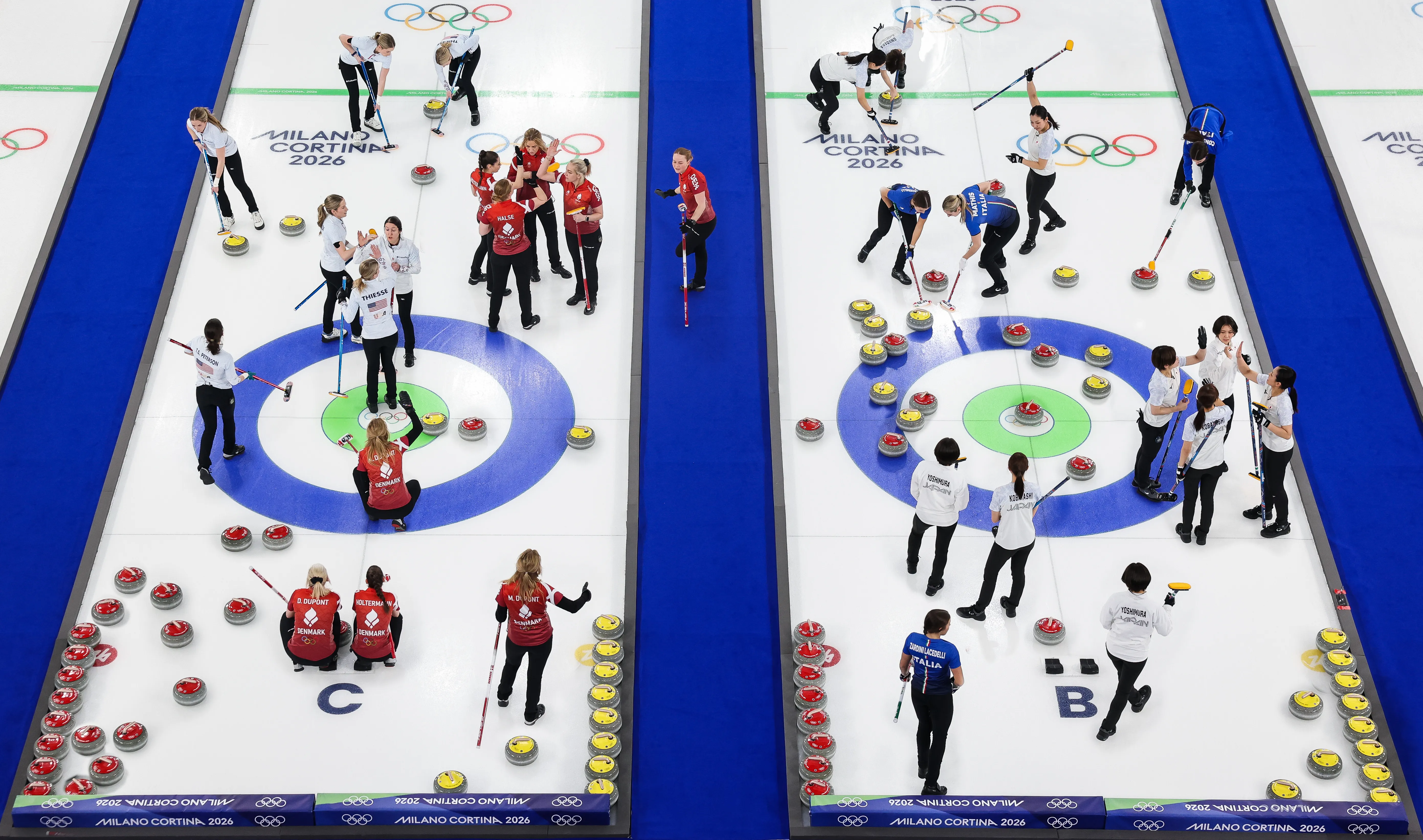 A digital composite of athletes competing during the Women's Round Robin Session between Team Denmark and Team United States (Sheet C) and Team Italy and Team Japan (Sheet B) on day eleven.