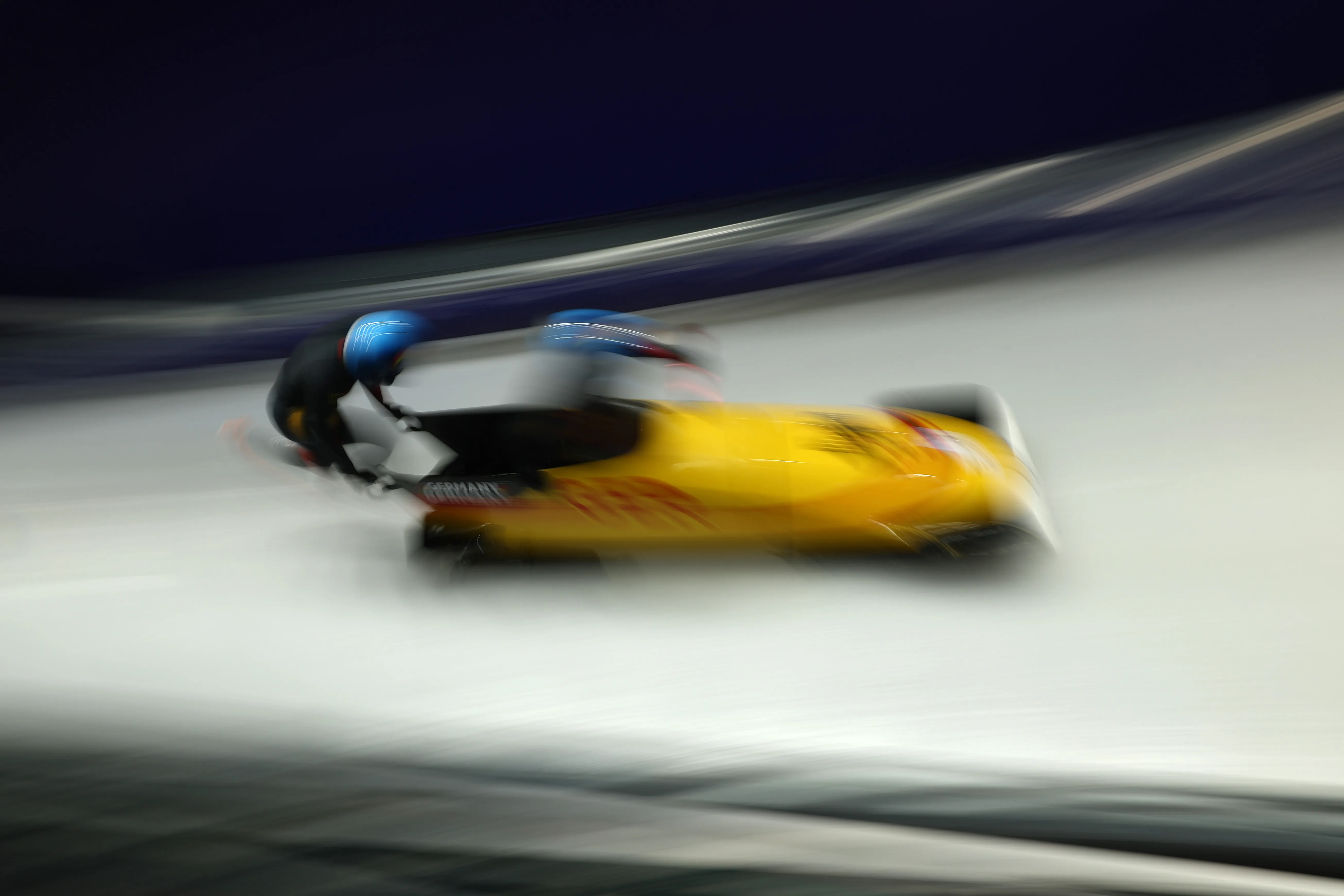 Adam Ammour and Alexander Schaller of Team Germany start the Two-Man Bobsleigh Heat 4 on day 11.