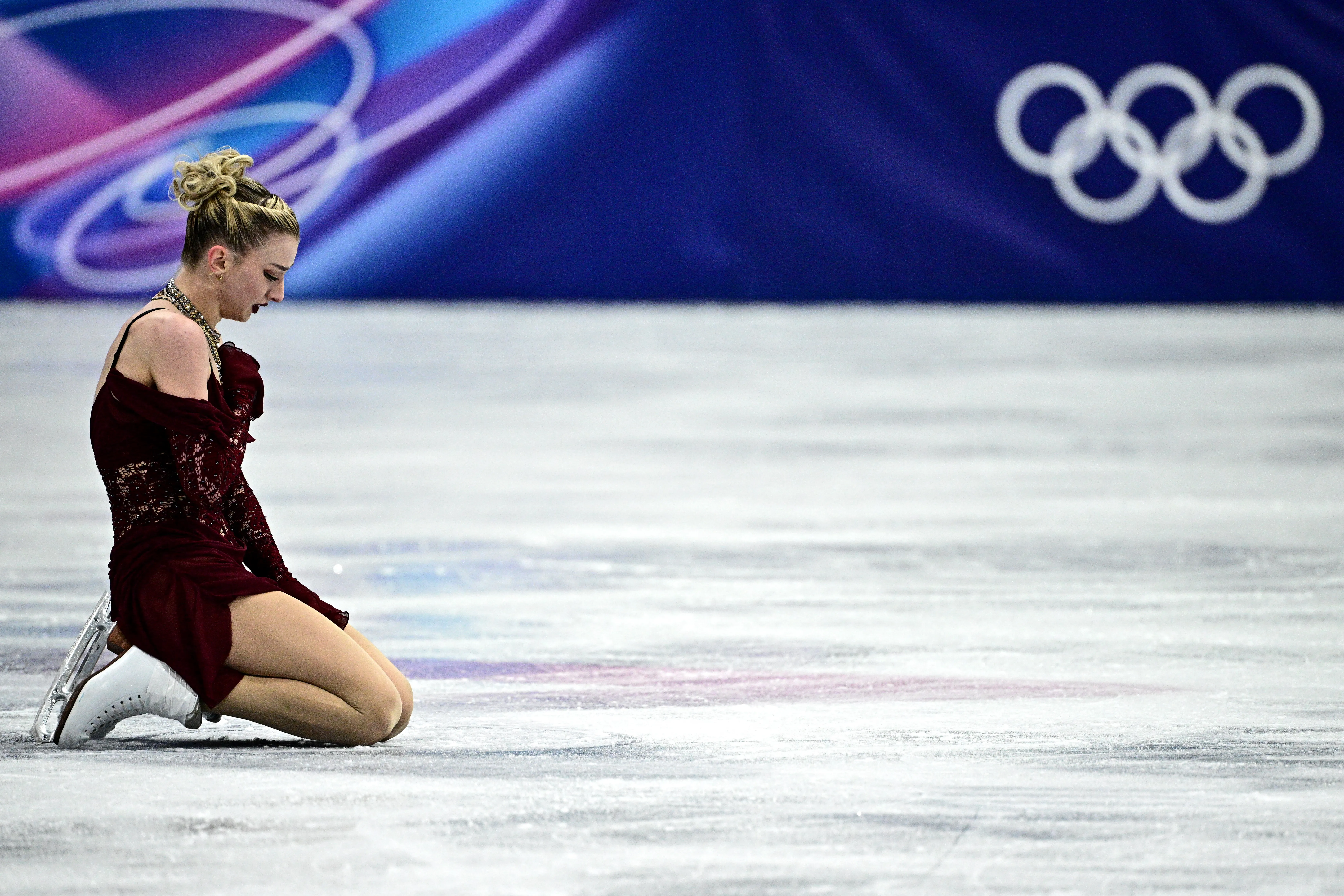 Amber Glenn reacts after competing in the figure skating women's single skating short program. 