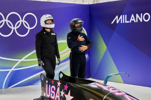 Elana Meyers Taylor and her pusher Jadin O'Brien start for a two-women bobsled training session.