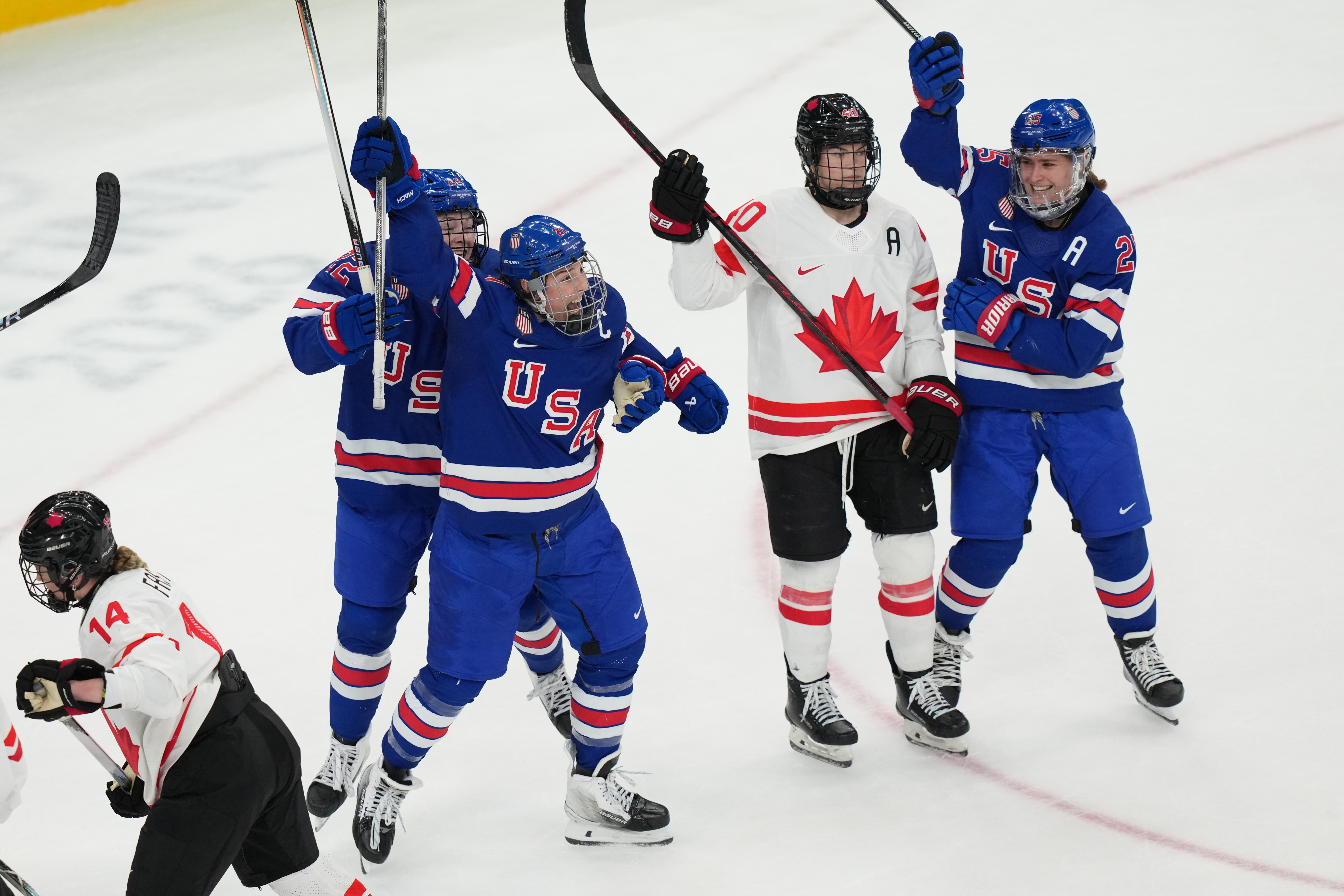 United States’ Hilary Knight, center, celebrates after scoring a goal...