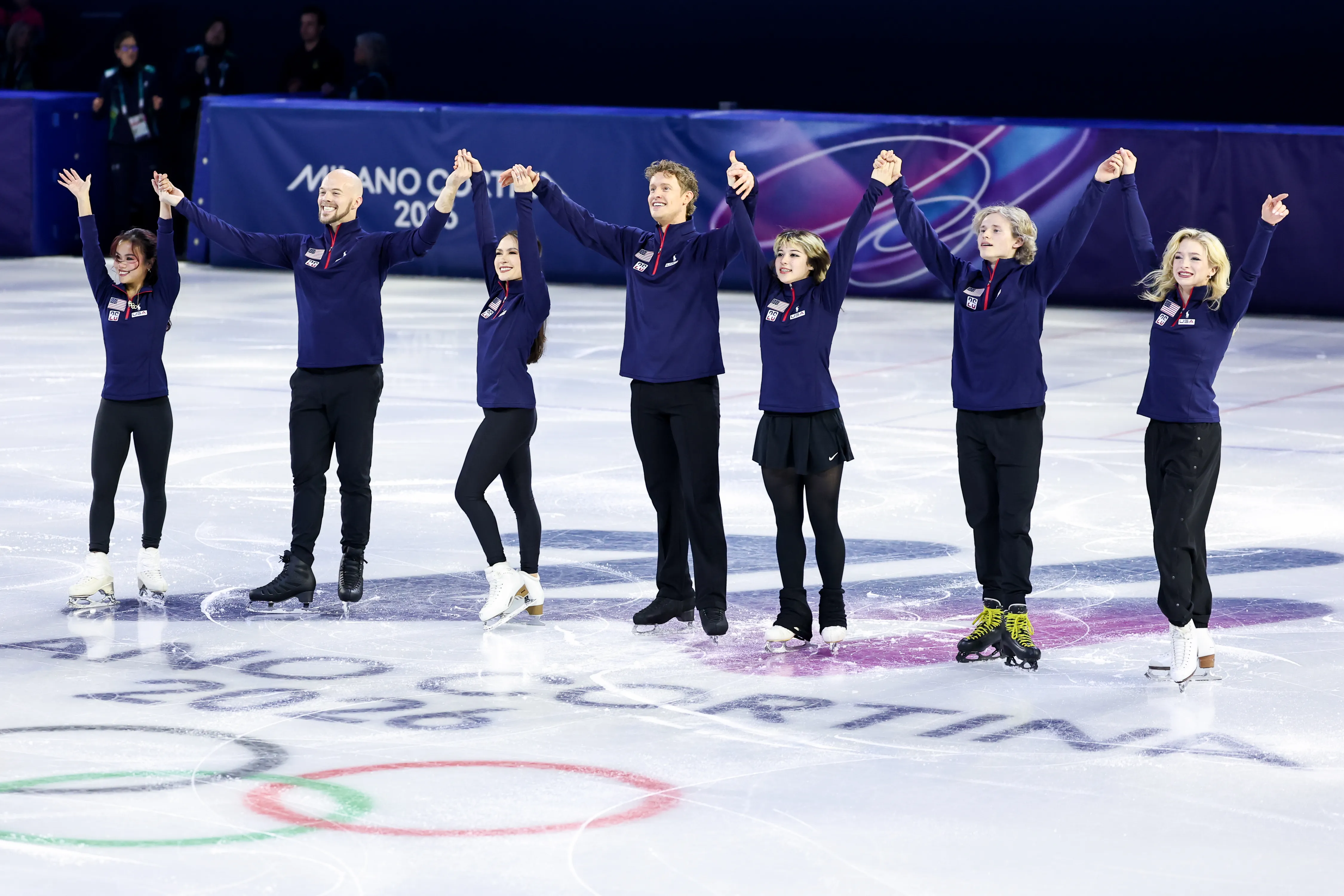 (Left to Right) Ellie Kam, Danny O'Shea, Madison Chock, Evan Bates, Alysa Liu, Ilia Malinin and Amber Glenn of Team United States perform in the Team Event routine during the Figure Skating Exhibition Gala. 