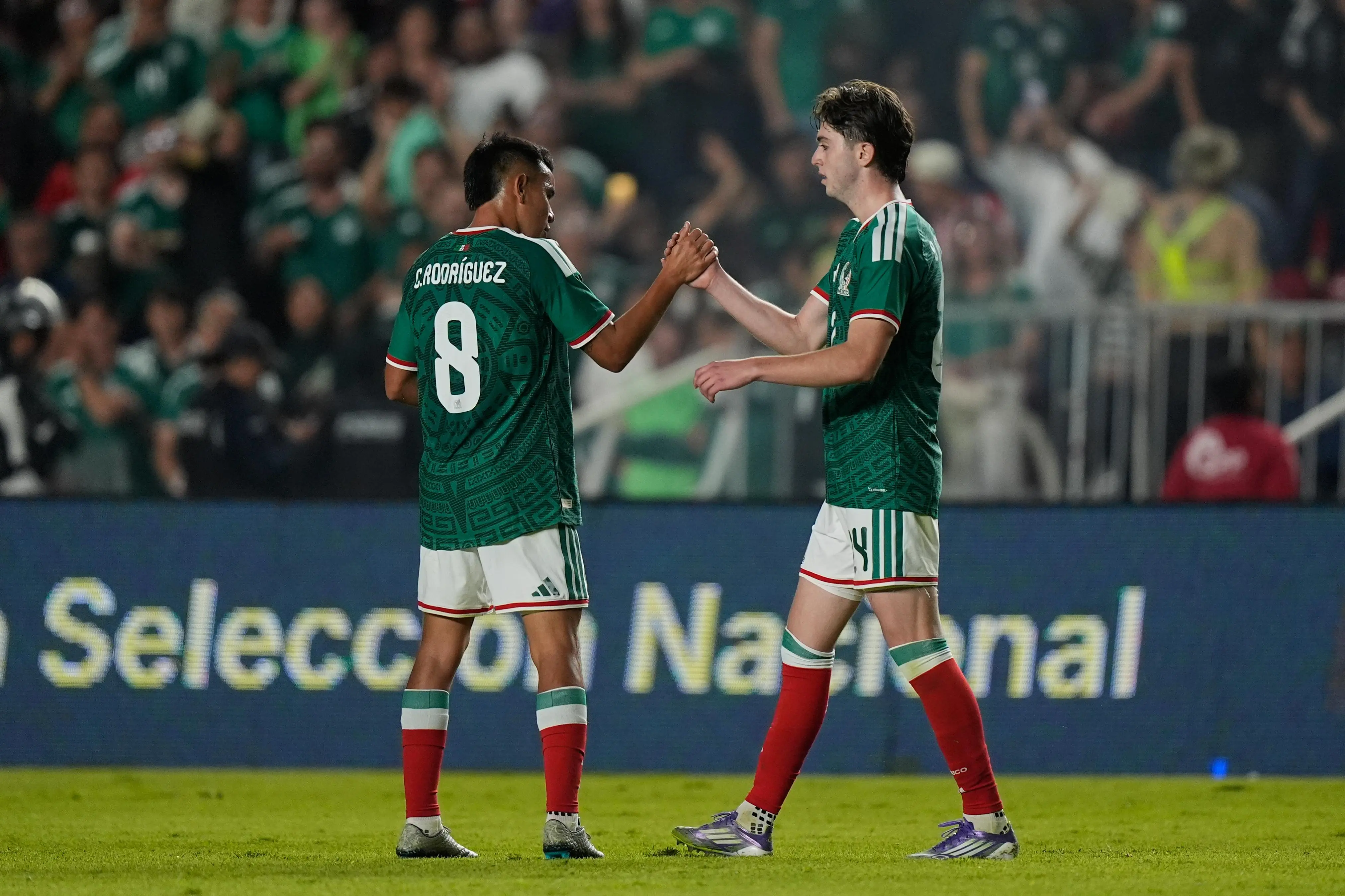 Mexico’s Brian Gutiérrez celebrates scoring his side’s fourth goal against...