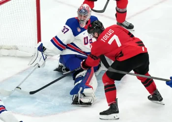 Hughes scores in overtime as US beats Canada for first men’s hockey gold at the Olympics since 1980