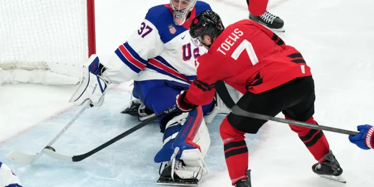 Hughes scores in overtime as US beats Canada for first men’s hockey gold at the Olympics since 1980