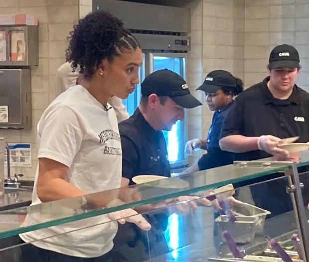UConn women's basketball star was meeting and greeting, mixing and dishing at Cava in Newington on Friday. (Dom Amore/Hartford Courant)