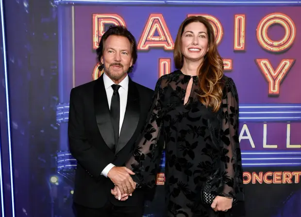 FILE - Eddie Vedder, left, and his wife Jill Vedder appear at the SNL50: The Homecoming Concert in New York on Feb. 14, 2025, (Photo by Evan Agostini/Invision/AP, File)