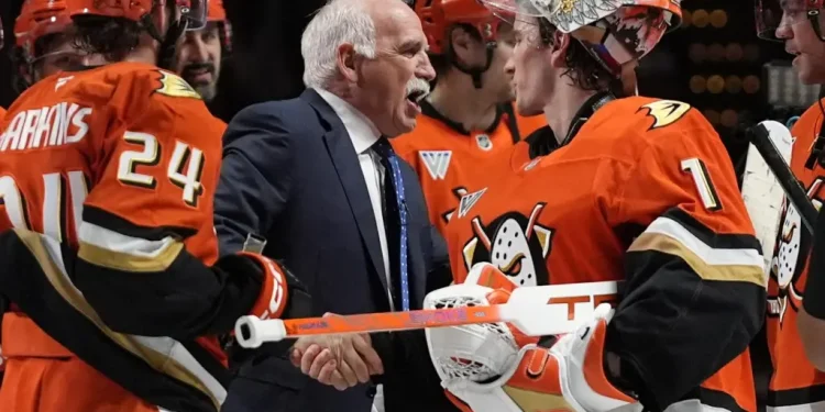 This former Hartford Whaler now one of only two coaches in NHL history to reach this milestone