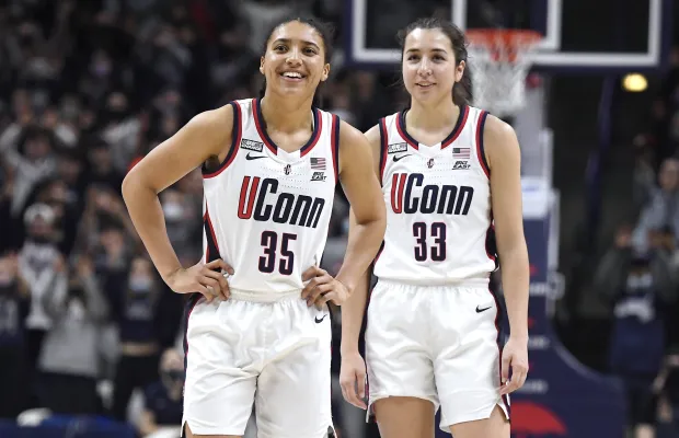 Azzi Fudd, left, and Caroline Ducharme are two of the five UConn women's players who will be honored following Sunday's game vs. Providence at Gampel Pavilion. (AP Photo/Jessica Hill)