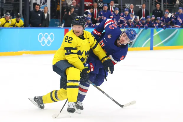 Team USA's Quinn Hughes follows through on his shot that resulted in the game-winning goal in overtime. (Bruce Bennett/Getty Images)