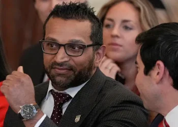 FBI director joins US men’s hockey team in locker room celebration of Olympic gold medal