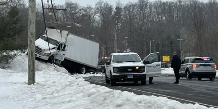 Box truck driver who crashed into utility pole Tuesday is charged with DUI