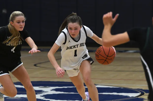 Kelsey LaMay (1) drives to the basket for Rocky Hill in a win earlier in the season against Coventry. LaMay had a double-double in a win over Maloney last week. (Photo by Lori Riley)