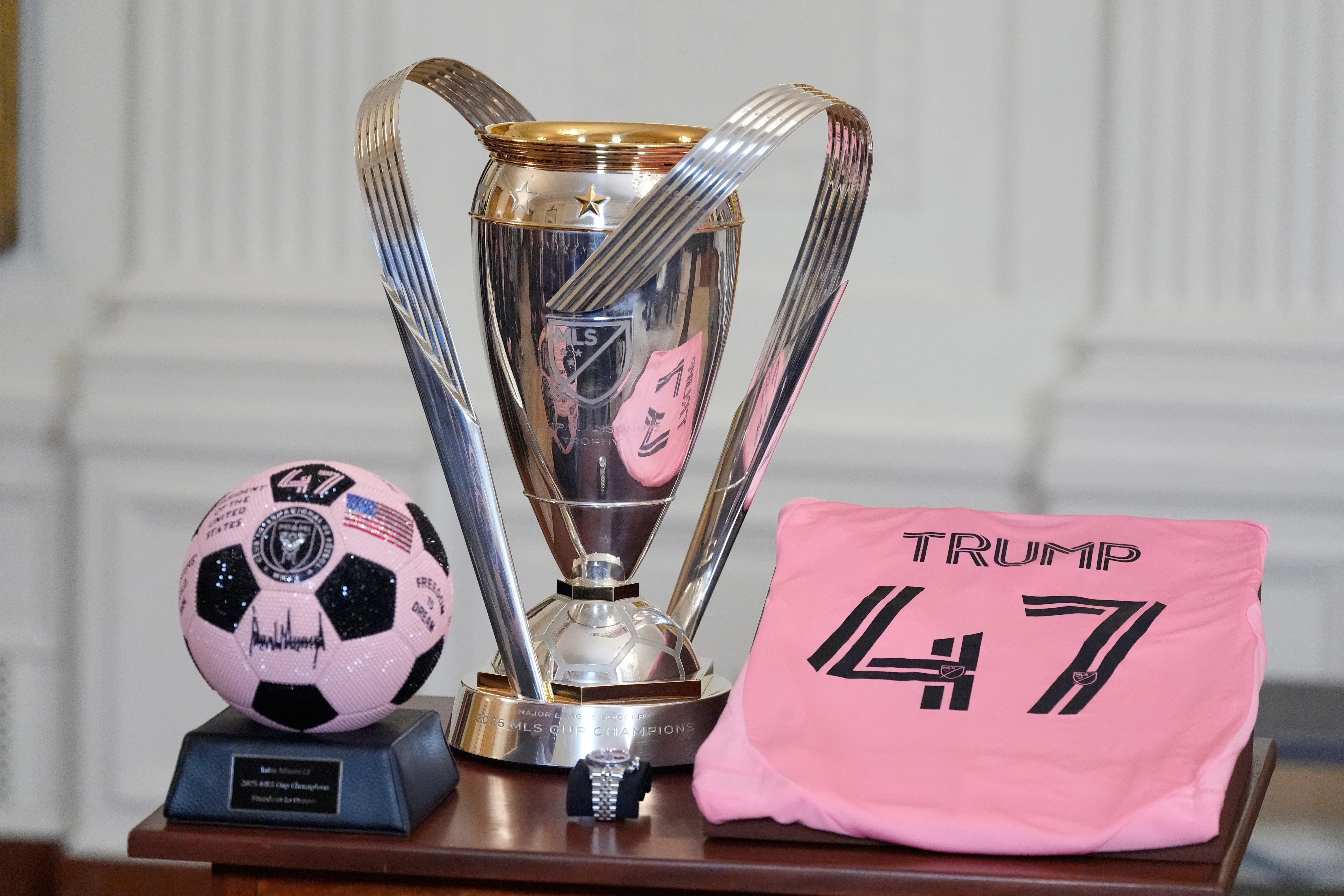 The trophy and gifts for President Donald Trump are displayed...