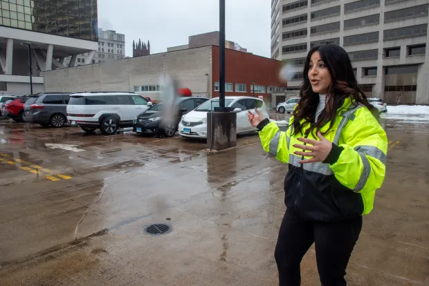Hartford Parking Authority CEO Khouloud "Kay" Al Mannai talks about upcoming renovations tothe rooftop parking area at the MAT Garage in downtown Hartford (Aaron Flaum/Hartford Courant)