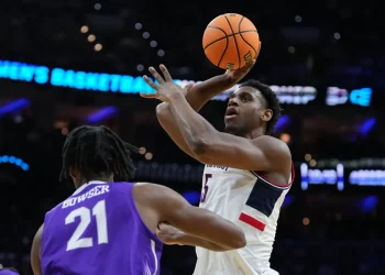 Tarris Reed Jr. has 31 points and 27 rebounds as No. 2 UConn beats Furman 82-71 in NCAA Tournament