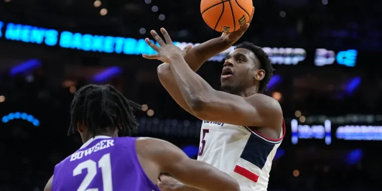 Tarris Reed Jr. has 31 points and 27 rebounds as No. 2 UConn beats Furman 82-71 in NCAA Tournament