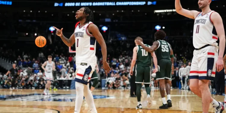 It's UConn vs. Duke for a Final Four spot after the Huskies edge Michigan State 67-63