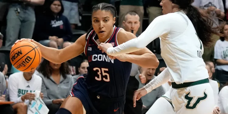 UConn women’s basketball fans claim Azzi Fudd’s mom Katie in Big East Legends celebration
