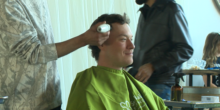 Community members buzz hair to support kids with cancer in Southington