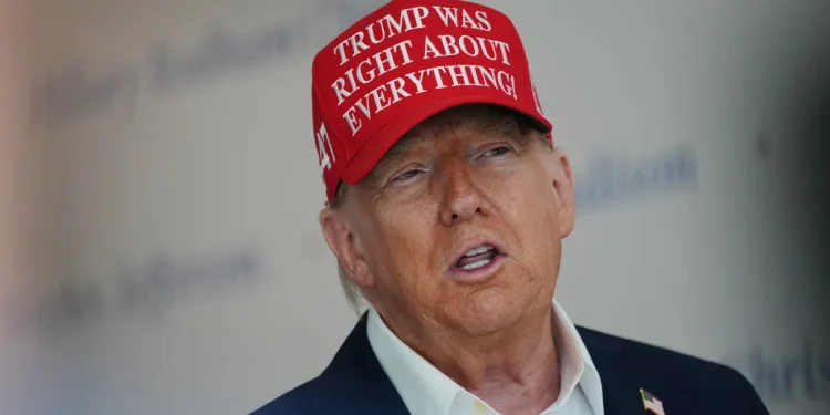 Trump casts a mail ballot again in Florida even as he calls the method ‘cheating'