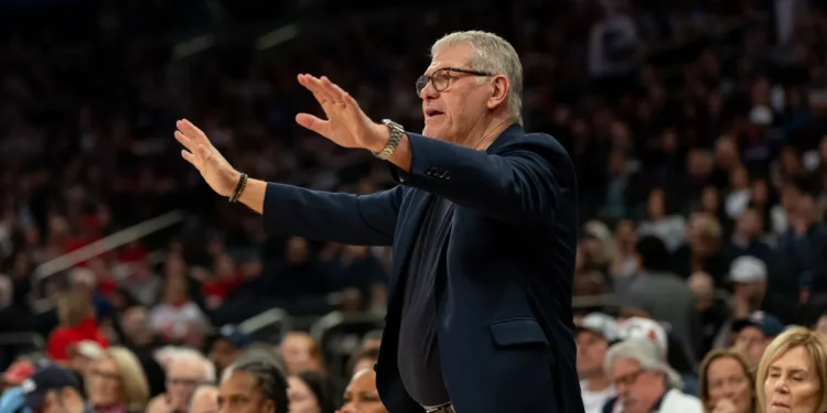 UConn caps its 11th unbeaten regular season, but coach Geno Auriemma warns tougher March ahead
