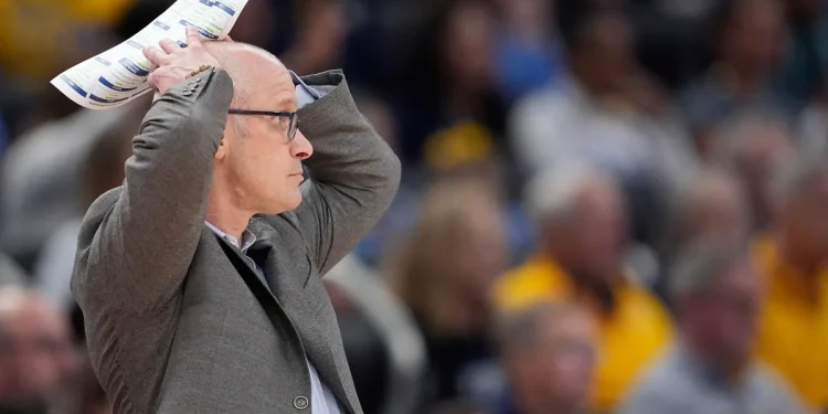 Hurley ejected in final second of Marquette's 68-62 win over No. 4 UConn