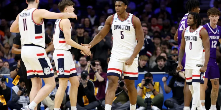 Tarris Reed Jr. has 31 points and 27 rebounds as No. 2 UConn beats Furman 82-71 in NCAA Tournament