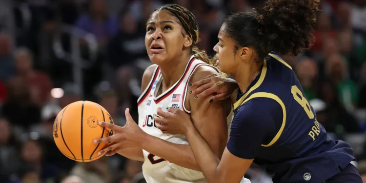 UConn and Geno Auriemma beat Notre Dame 70-52 to secure 25th women's Final Four appearance