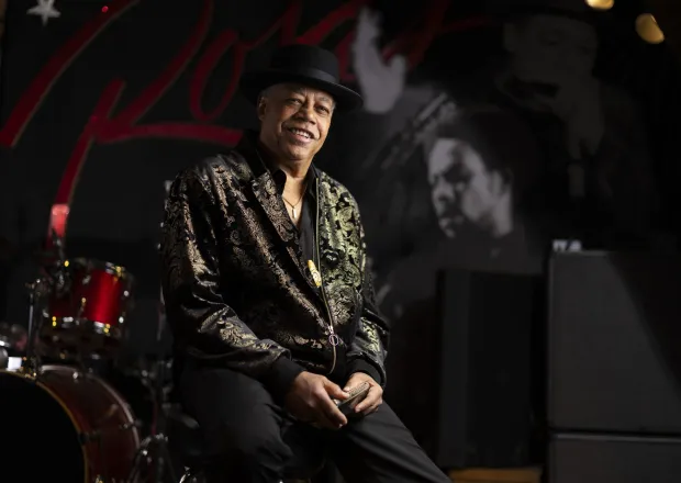 Blues harmonica player Billy Branch poses on stage at Rosa's Lounge in Logan Square on Feb. 24, 2026. (Eileen T. Meslar/Chicago Tribune)