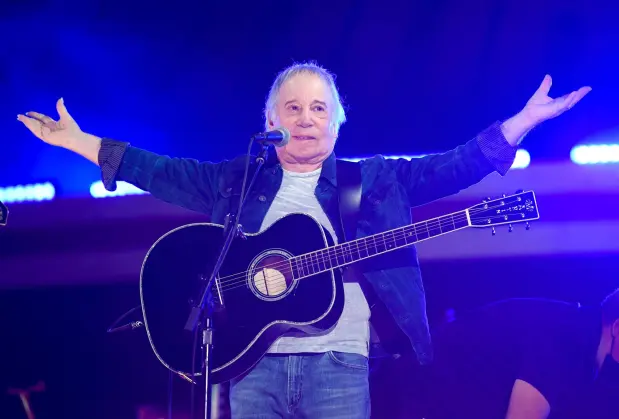 FILE - Singer-songwriter Paul Simon performs at Global Citizen Live in Central Park on Sept. 25, 2021, in New York. (Photo by Evan Agostini/Invision/AP, File)
