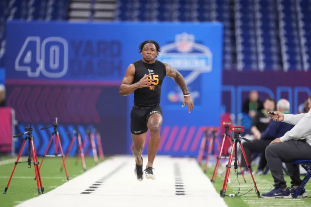 UConn wide receiver Skyler Bell (05) runs the 40-yard dash at the NFL football scouting combine in Indianapolis, Saturday, Feb. 28, 2026. (AP Photo/Michael Conroy)