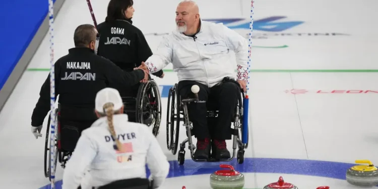 Paralympians try to focus on Milan Cortina Games amid tensions over Iran war, return of Russian flag