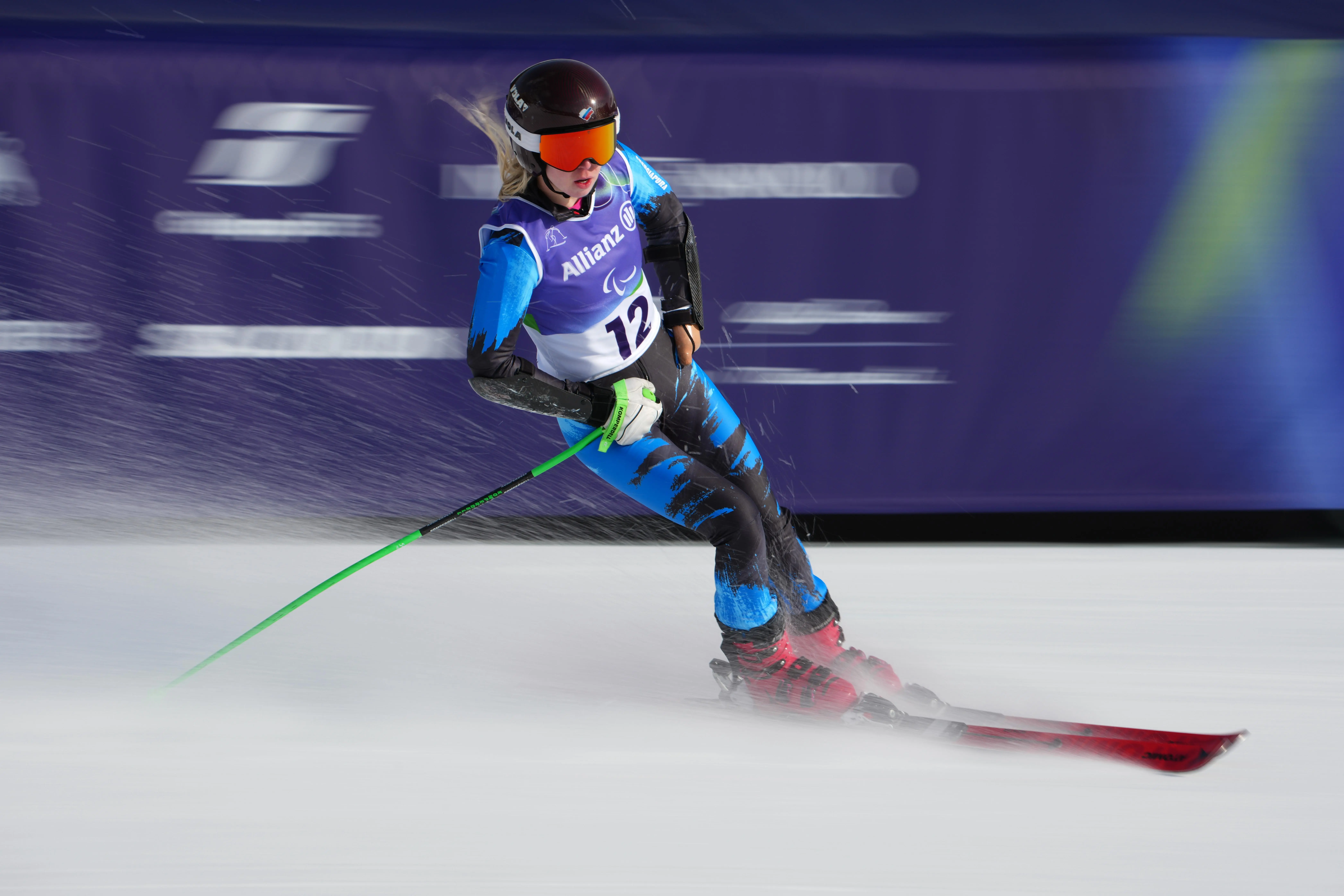 Varvara Voronchikhina, of Russia, crosses the finish line in the alpine skiing women's super-G standing final.