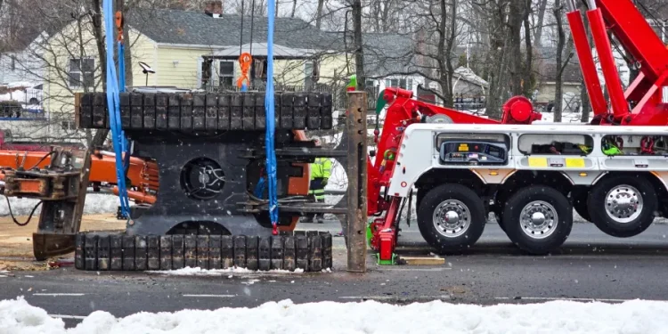 Tractor-trailer rolls over, leaks dozens of gallons of fuel in West Haven