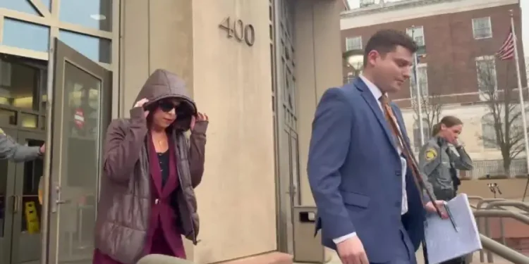 Woman accused of holding stepson captive shares no comment after pre-trial hearing