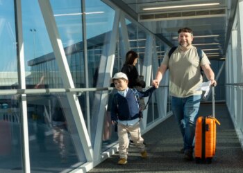Families practice boarding a plane in ‘Autism Flies' event at Bradley