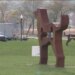 Dog sculptures towering over Savin Rock boardwalk in West Haven