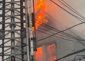 Four people displaced after two houses catch fire in Waterbury