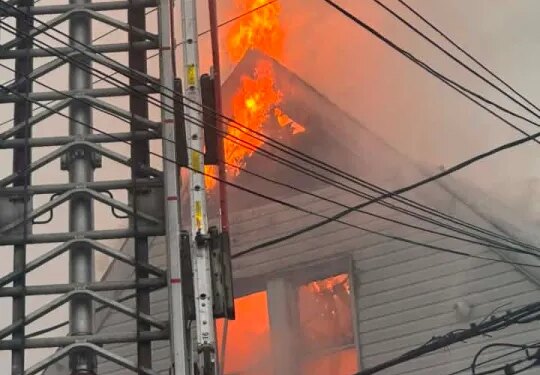 Four people displaced after two houses catch fire in Waterbury