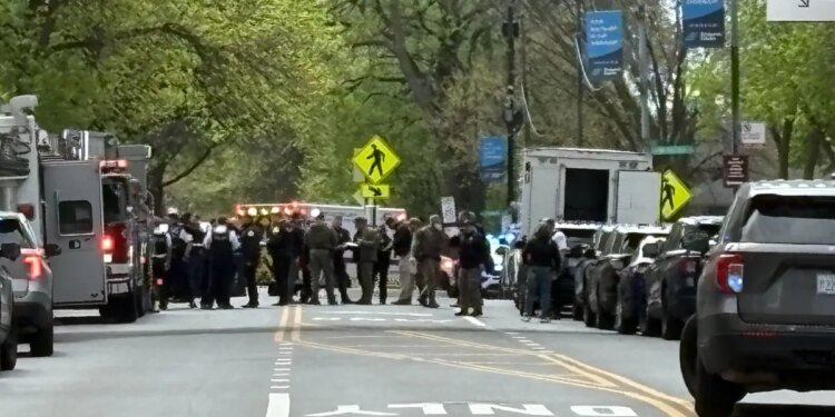 Two police officers shot at Chicago hospital, one in critical condition