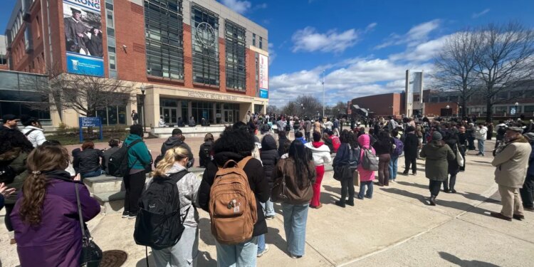 Students rally at Southern Connecticut State University after ICE detain classmate