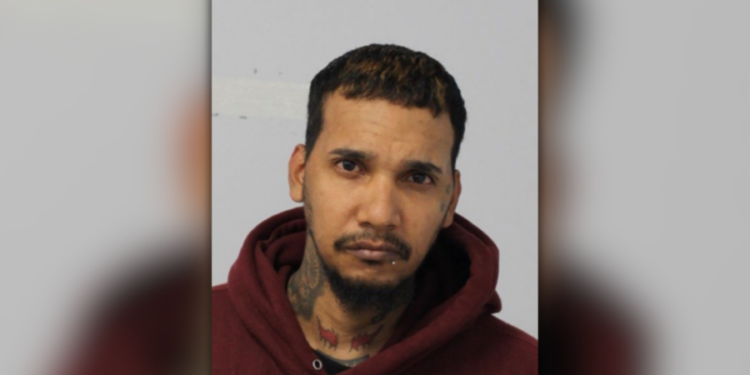 Man arrested on drug distribution, firearms charges after search warrant at Willimantic home
