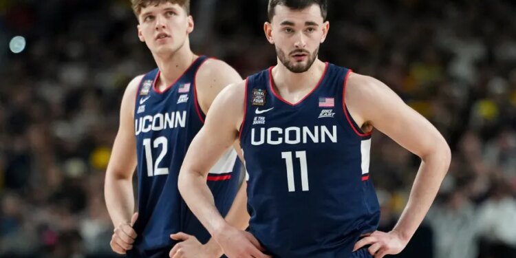 PHOTO GALLERY: UConn and Michigan face off in NCAA championship