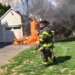 PHOTOS: Flames engulf lawnmower outside Norwalk home