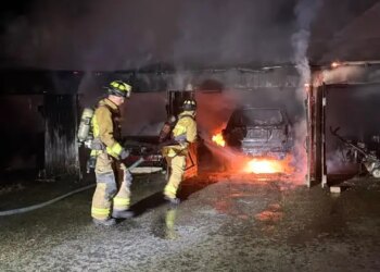 PHOTOS: Garage, vehicles destroyed after Naugatuck brush fire