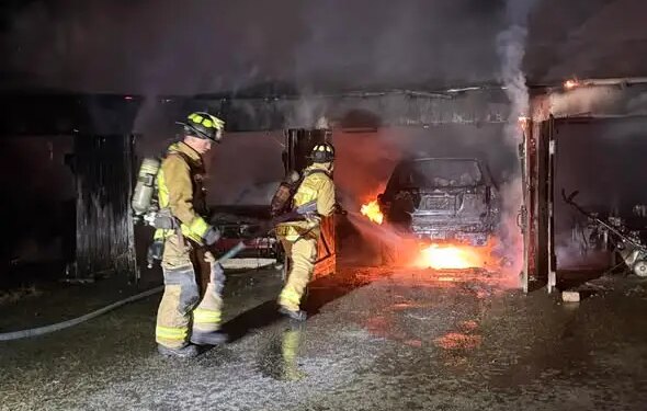 PHOTOS: Garage, vehicles destroyed after Naugatuck brush fire