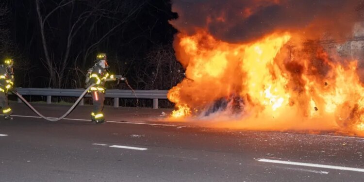 PHOTOS: None injured after van fire on I-91 South in Hartford on Friday